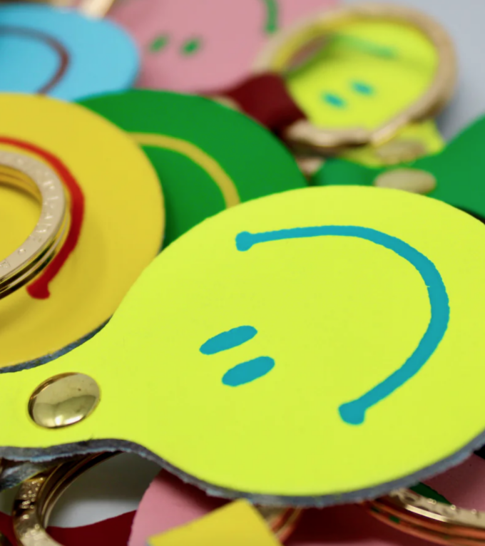 Porte clé feeling Lush Smile Face - Rose